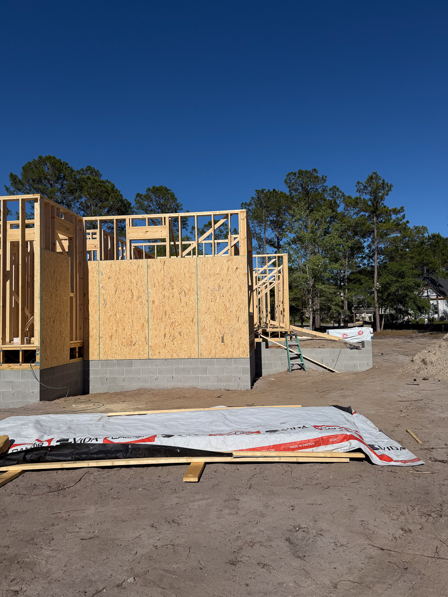 Wall framing and sheathing rising on block foundation of a new coastal home